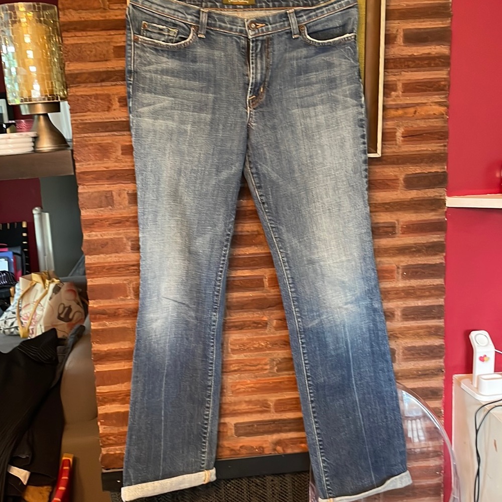 Boyfriend fit jeans with a gray wash and style.